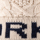Cream ORKNEY Knit Pom Pom Beanie Hat close up