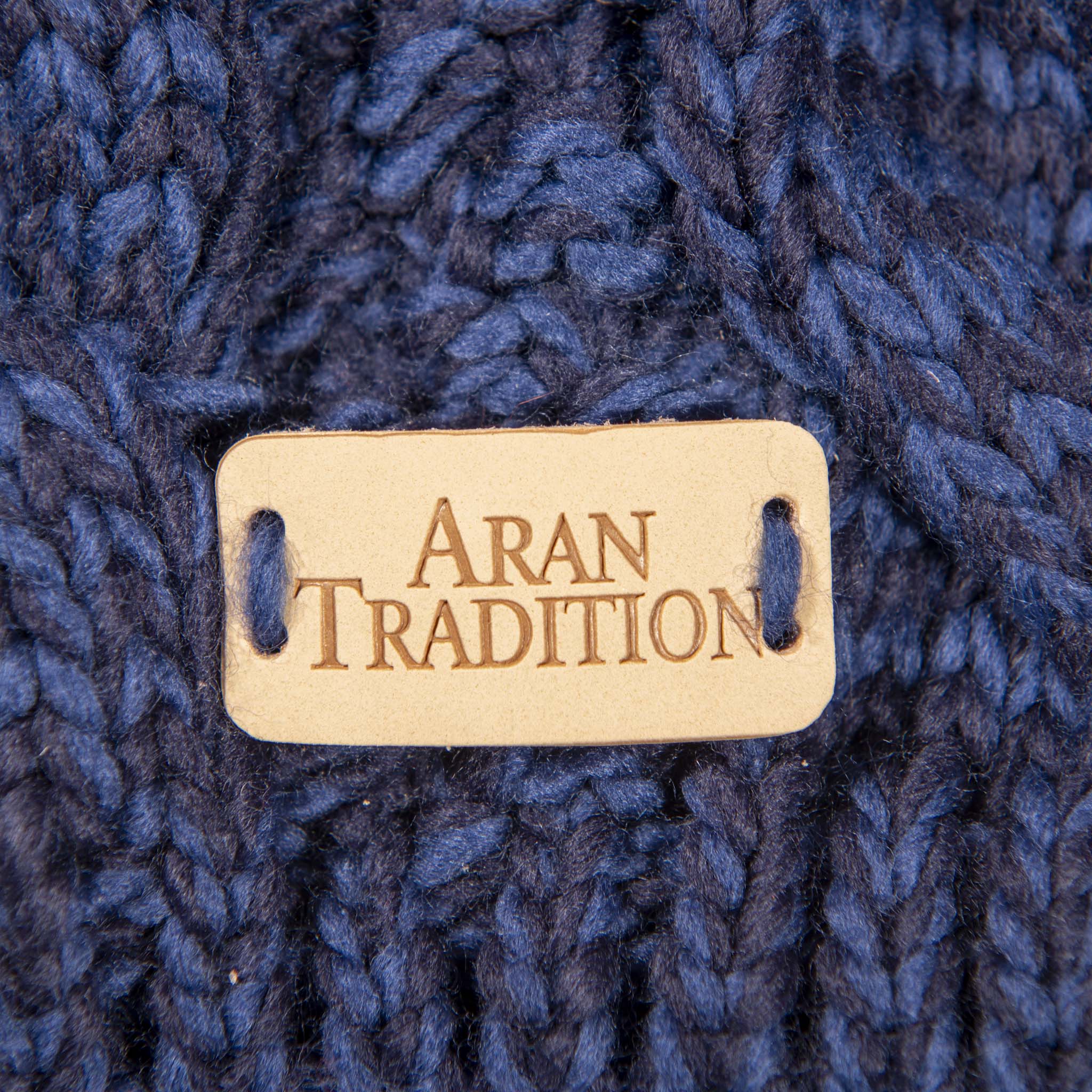 Shop the Stylish Aran Cable Tammy Hat with Faux Fur Trim