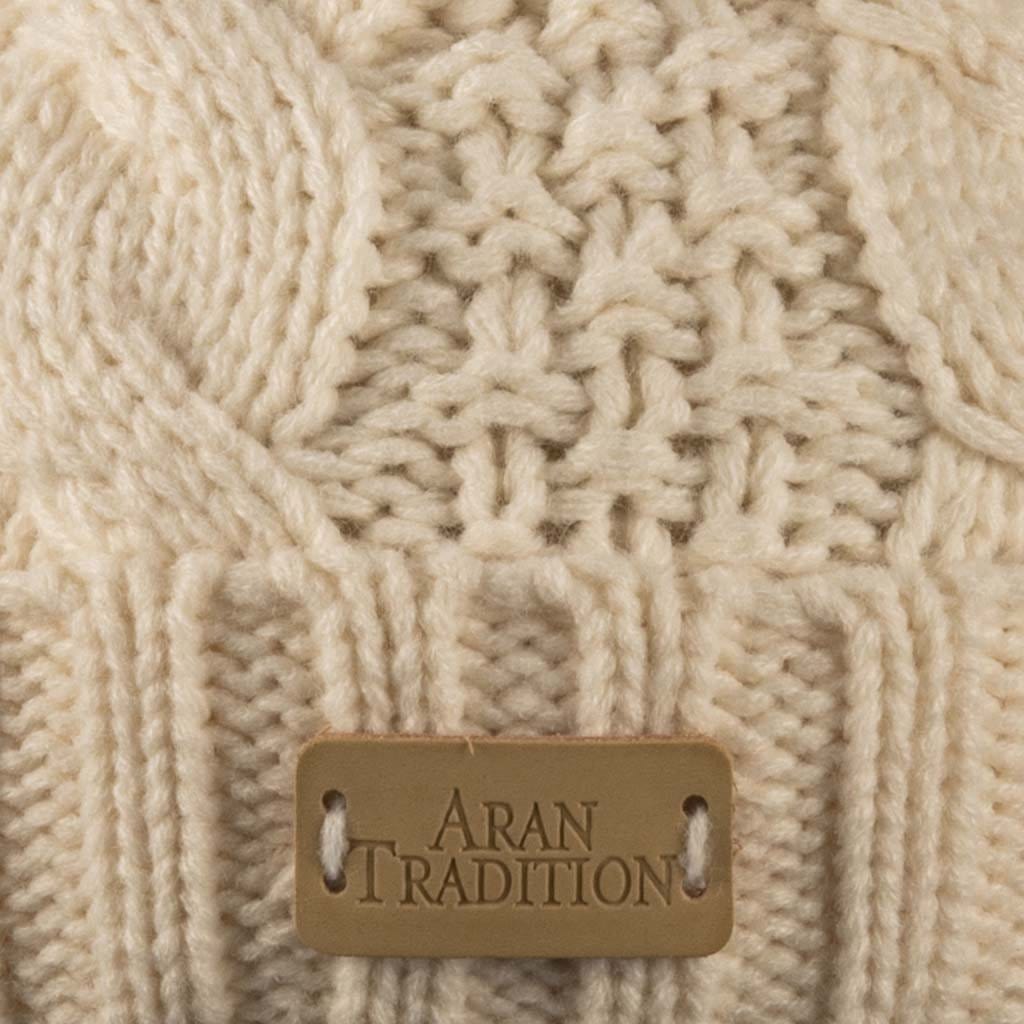 Stay Cozy & Chic with Aran Cable Pom Pom Hat | Traditional Cable Knit
