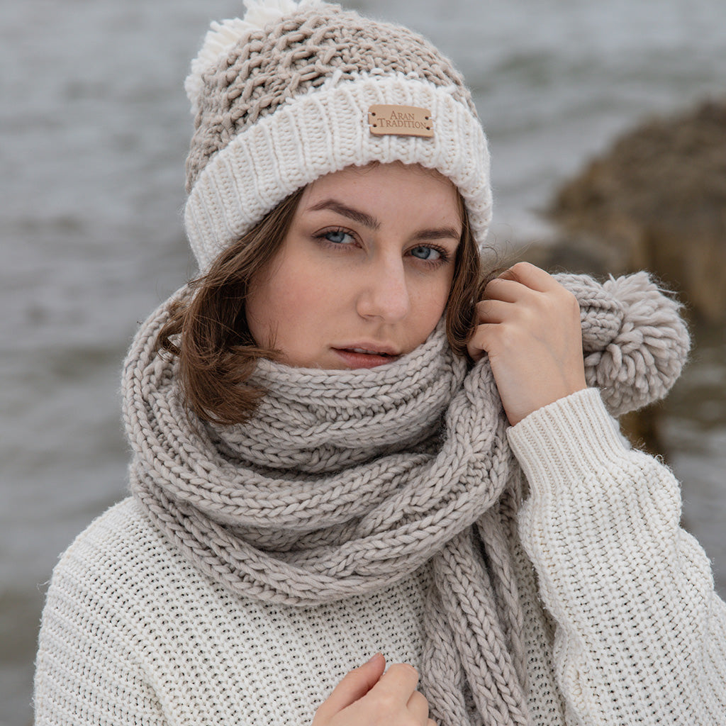 Elevate Your Winter Style with Aran Cable Knit Pom Pom Scarf